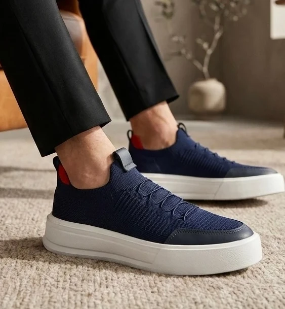 Detalhe do tecido knit respir&aacute;vel t&ecirc;nis masculino Ferr leve e ventilado